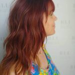 All Over Red Hair Coloring with Accents of Foiled Highlights - Softed Curled Waves Styling - Reverence Hair Studio in Knoxville, TN.jpeg